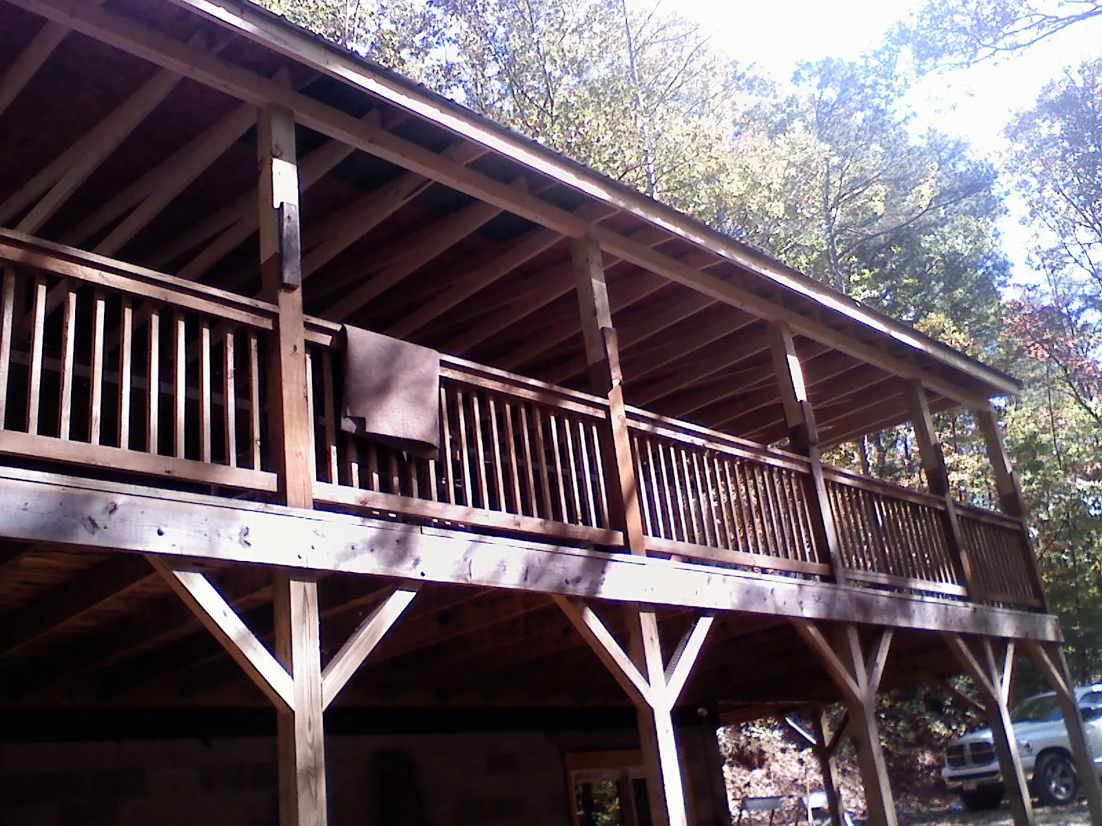 Timber framing under a new elevated porch and deck — Roof Leak Repair in Goldston by Roofing Brothers